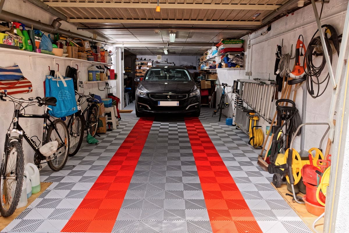 sol Polydal gris alu foncé et orange pour garage privé